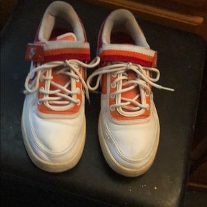 Nike orange and red tennis shoes.  Size 8 $28.00